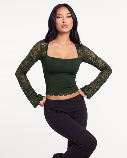 Amara Lace Top in Green – emotional pose | SKU: SOR-AMARA-GRN-XS,SOR-AMARA-GRN-S,SOR-AMARA-GRN-M,SOR-AMARA-GRN-L,SOR-AMARA-GRN-XL