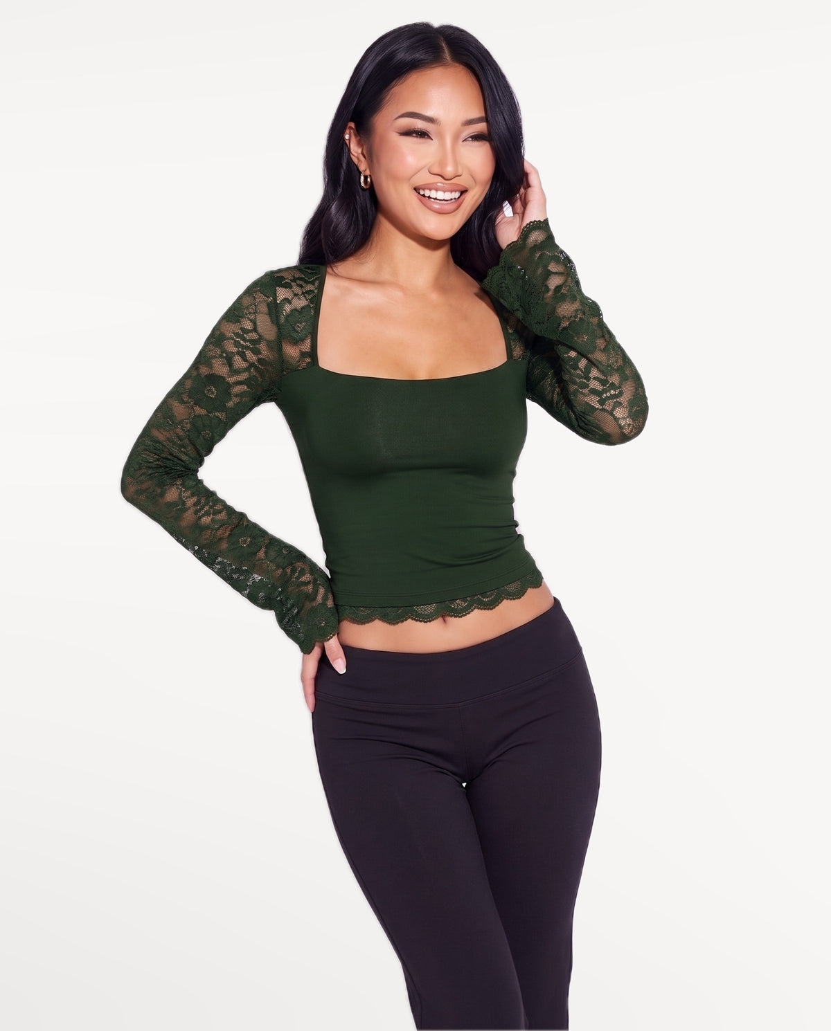 Amara Lace Top in Green – emotional pose | SKU: SOR-AMARA-GRN-XS,SOR-AMARA-GRN-S,SOR-AMARA-GRN-M,SOR-AMARA-GRN-L,SOR-AMARA-GRN-XL