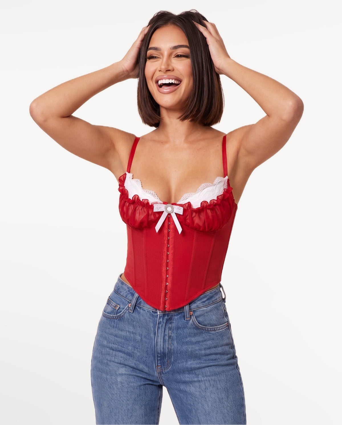 Odette Corset Top in Red – emotional pose | SKU: SOR-ODETTE-RED-XS,SOR-ODETTE-RED-S,SOR-ODETTE-RED-M,SOR-ODETTE-RED-L,SOR-ODETTE-RED-XL