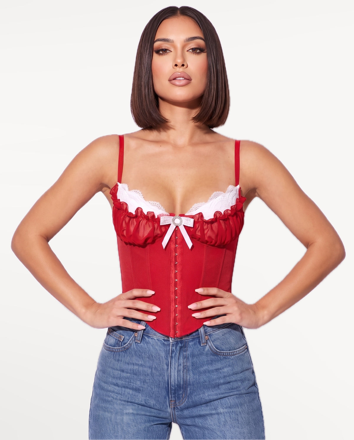 Odette Corset Top in Red – emotional pose | SKU: SOR-ODETTE-RED-XS,SOR-ODETTE-RED-S,SOR-ODETTE-RED-M,SOR-ODETTE-RED-L,SOR-ODETTE-RED-XL