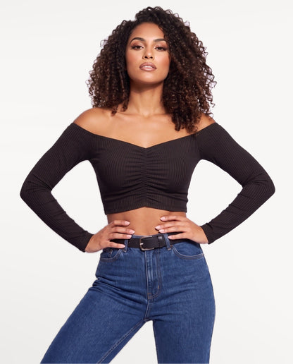 Rosa Bardot Top in Black – emotional pose | SKU: SOR-ROSA-BLK-XS,SOR-ROSA-BLK-S,SOR-ROSA-BLK-M,SOR-ROSA-BLK-L,SOR-ROSA-BLK-XL