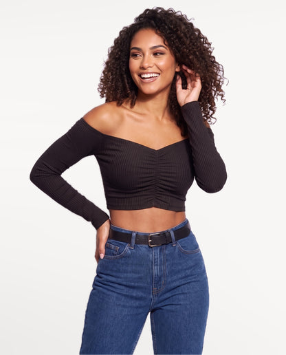 Rosa Bardot Top in Black – emotional pose | SKU: SOR-ROSA-BLK-XS,SOR-ROSA-BLK-S,SOR-ROSA-BLK-M,SOR-ROSA-BLK-L,SOR-ROSA-BLK-XL